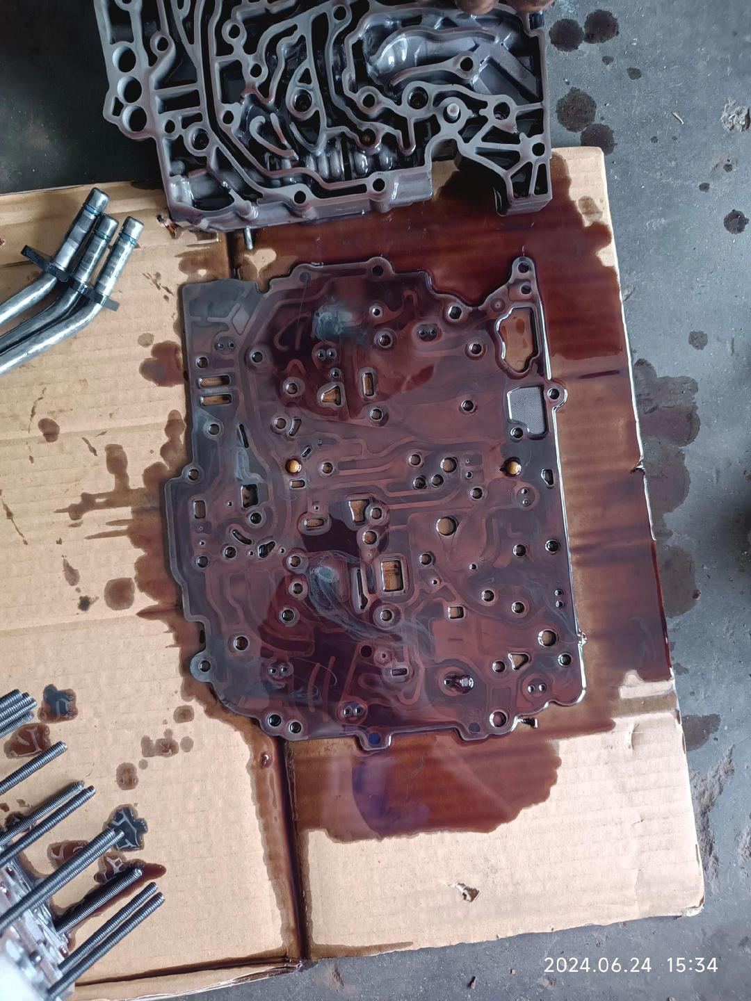 take off the transmission valve cover